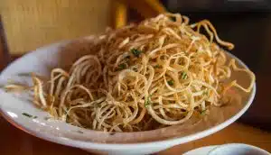 Shoestring potatoes are a wonderful pick for the Farr Better Creamiest Dairy-Free Alfredo Sauce