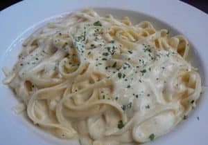 Finally, you get to smother your noodles with creamiest alfredo sauce on top.